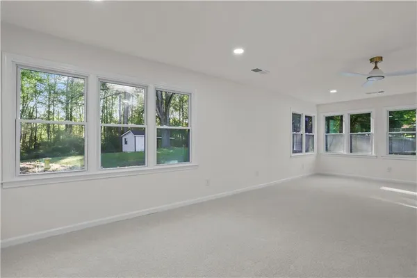 an empty room with windows