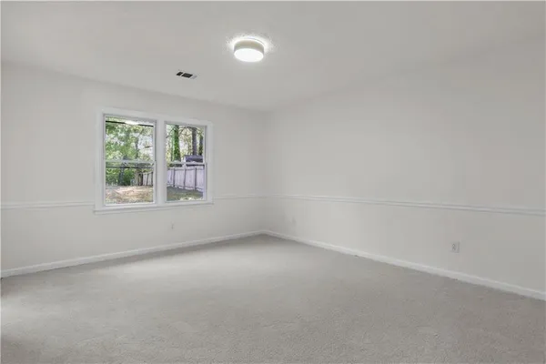 an empty room with a window