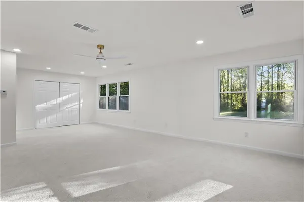 an empty room with windows