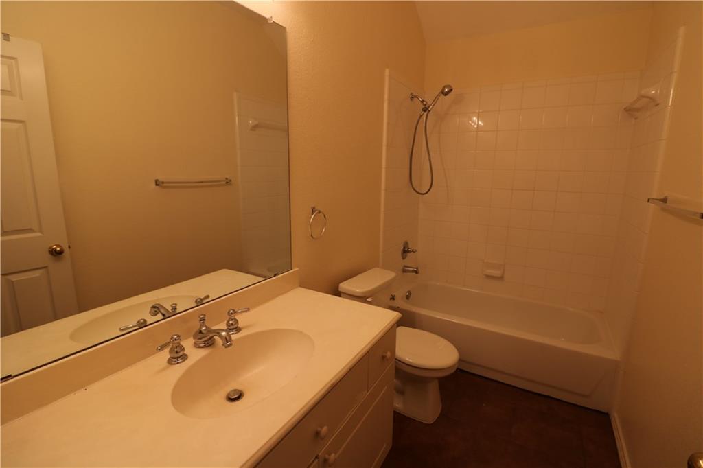 4341 Brinker Court Plano, TX 75024 - Photo 11 of 21 a bathroom with a sink a toilet and shower