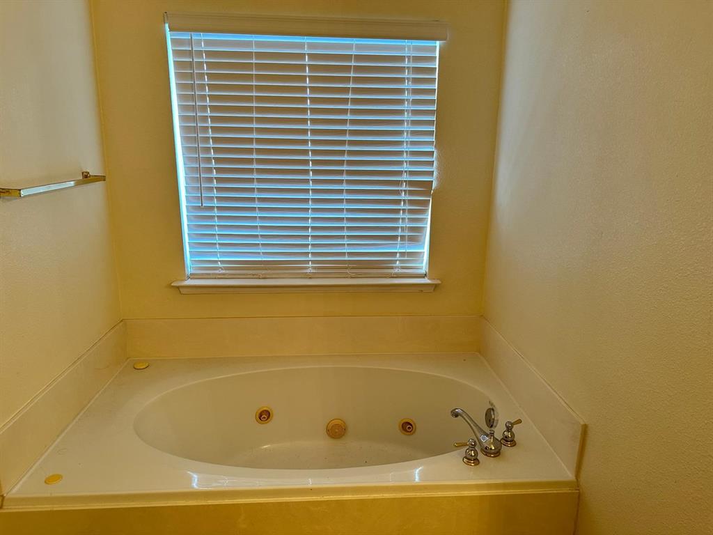 4341 Brinker Court Plano, TX 75024 - Photo 17 of 21 a bathroom with a bathtub