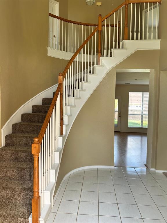 4341 Brinker Court Plano, TX 75024 - Photo 5 of 21 a view of entryway and hall with wooden floor