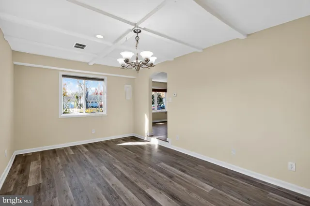 a view of livingroom with hardwood floor and hallway