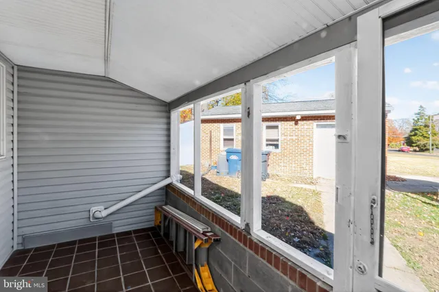 a view of a balcony with wooden floor