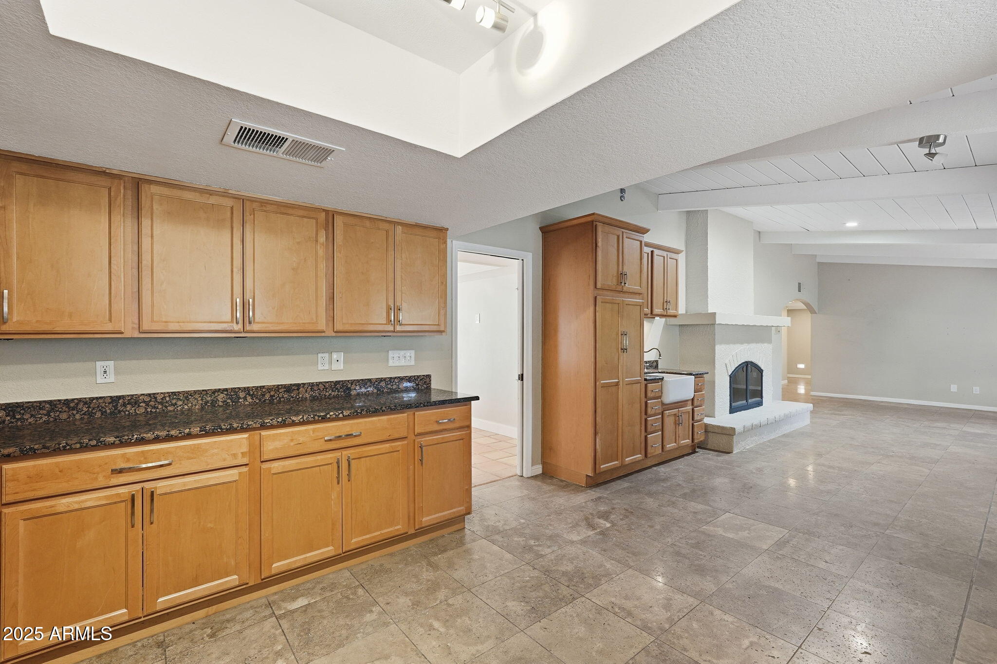 914 South 132nd Street Gilbert, AZ 85233 - Photo 22 of 55 a view of a kitchen with a sink cabinets and a window