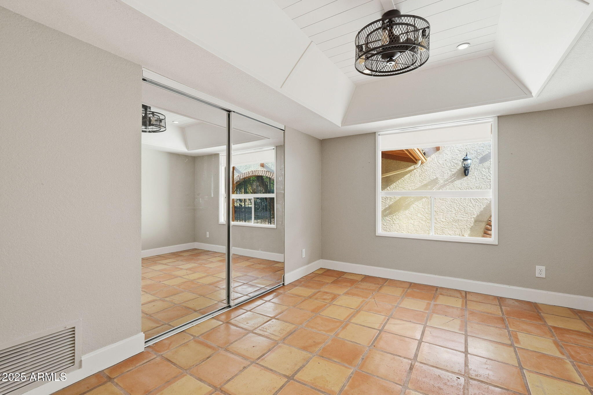 914 South 132nd Street Gilbert, AZ 85233 - Photo 23 of 55 a view of an empty room with a window