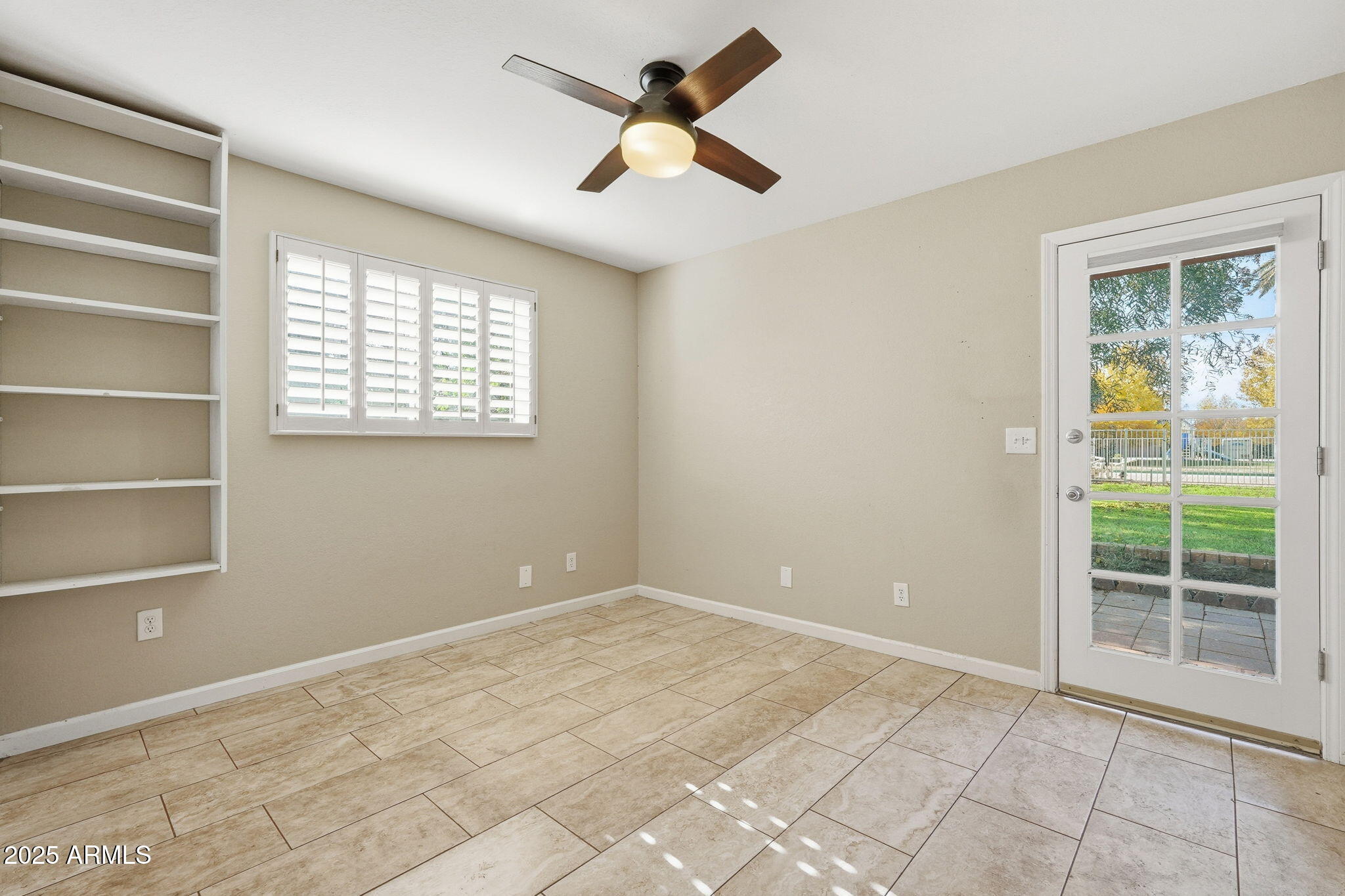 914 South 132nd Street Gilbert, AZ 85233 - Photo 29 of 55 a view of an empty room with a window