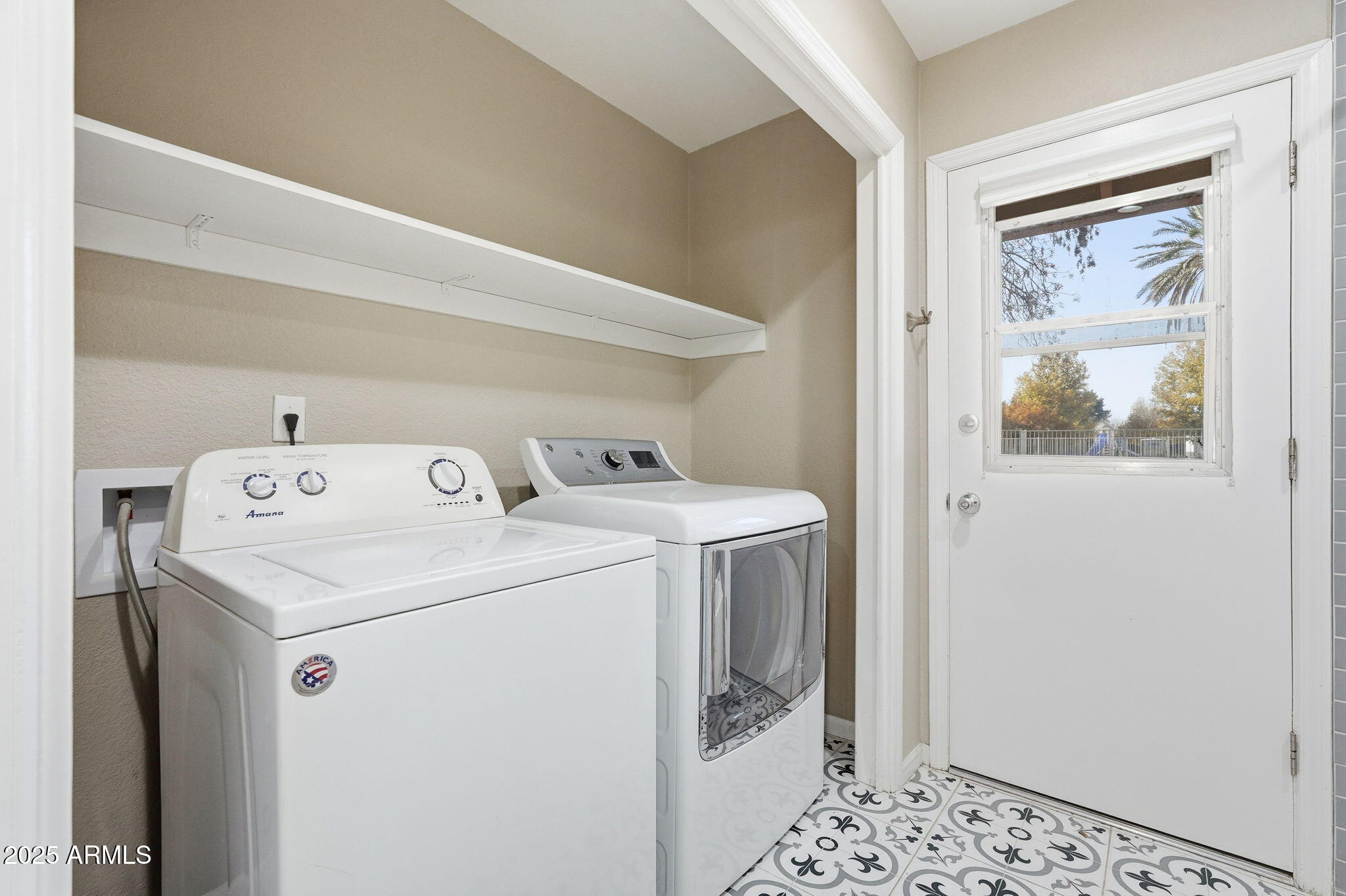 914 South 132nd Street Gilbert, AZ 85233 - Photo 31 of 55 a utility room with dryer and washer