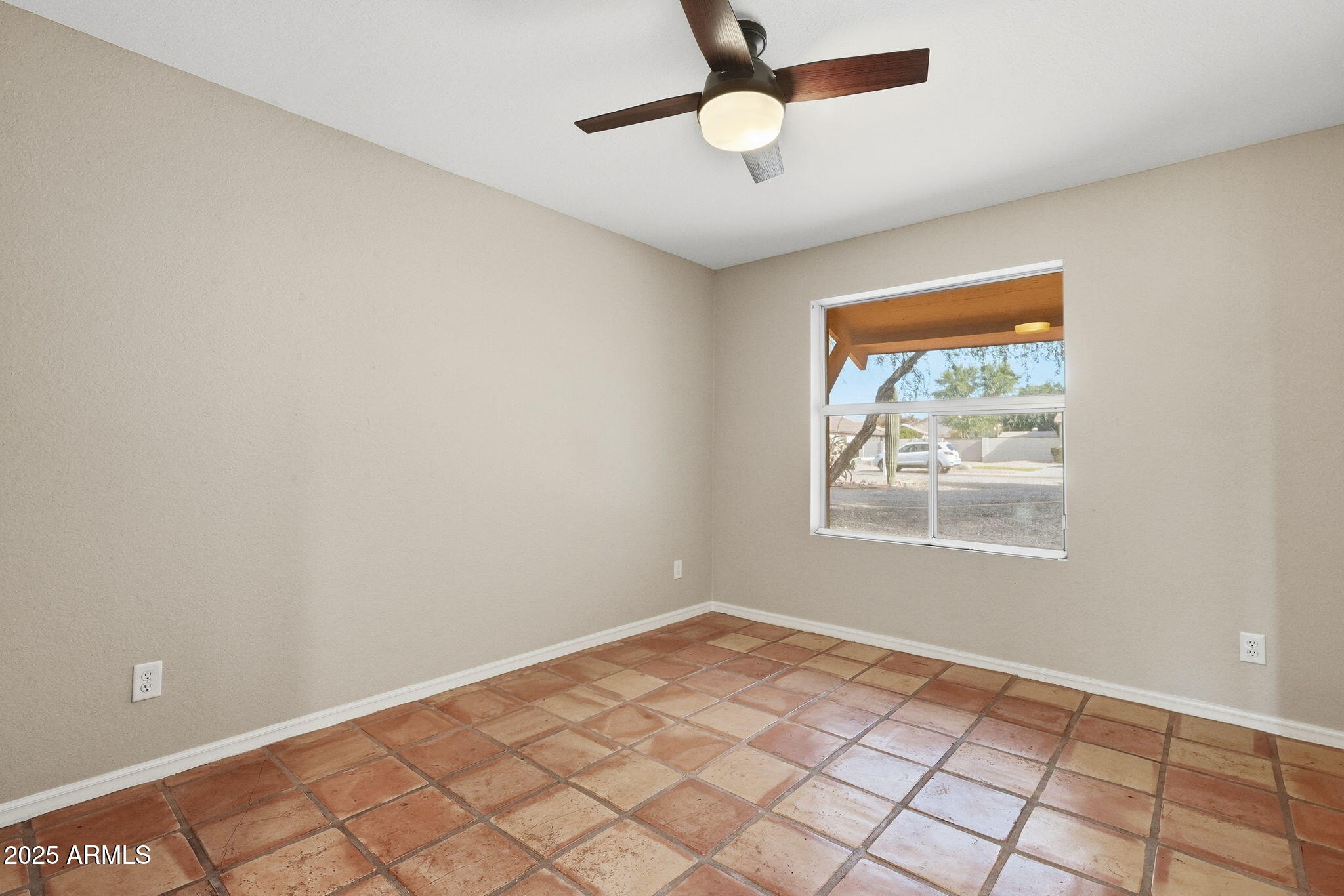 914 South 132nd Street Gilbert, AZ 85233 - Photo 33 of 55 an empty room with windows and fan