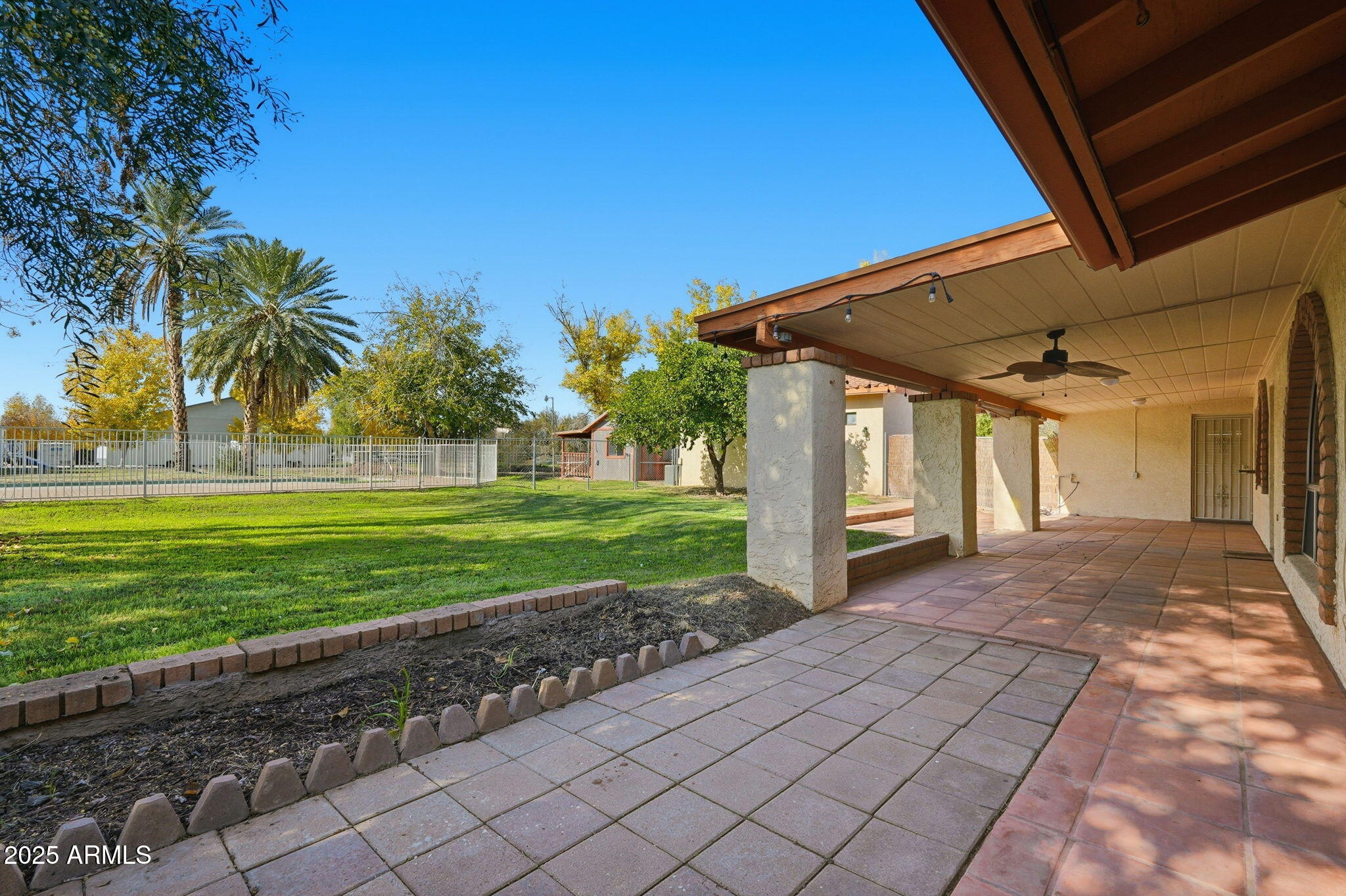 914 South 132nd Street Gilbert, AZ 85233 - Photo 36 of 55 a view of a house with a yard