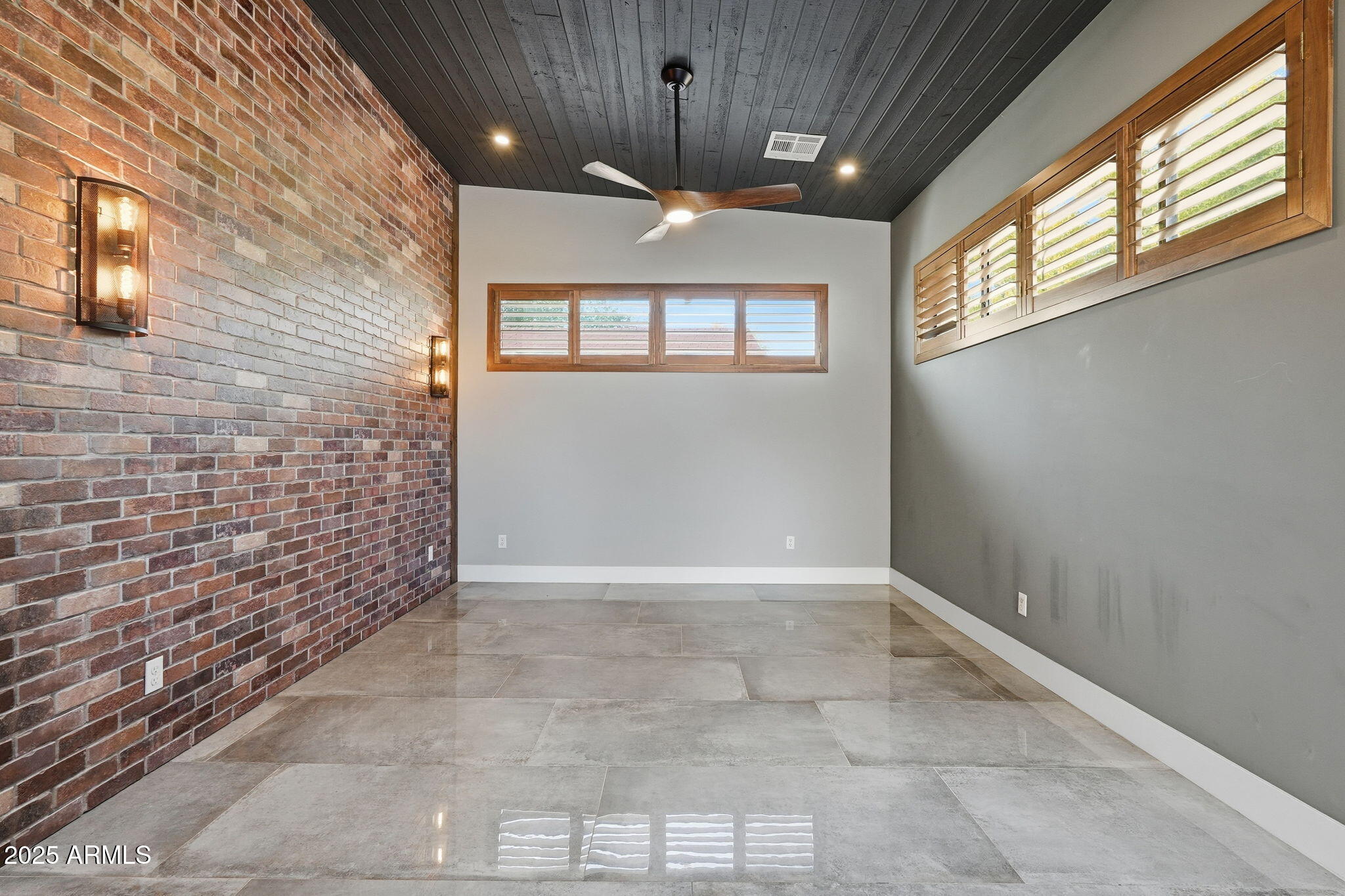 914 South 132nd Street Gilbert, AZ 85233 - Photo 41 of 55 a view of an empty room with a window