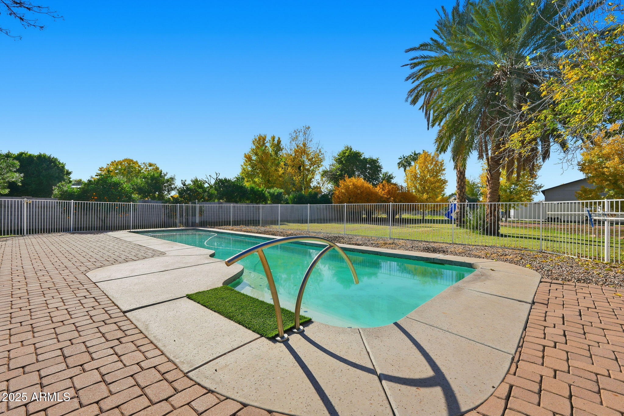 914 South 132nd Street Gilbert, AZ 85233 - Photo 49 of 55 a view of swimming pool with lounge chair