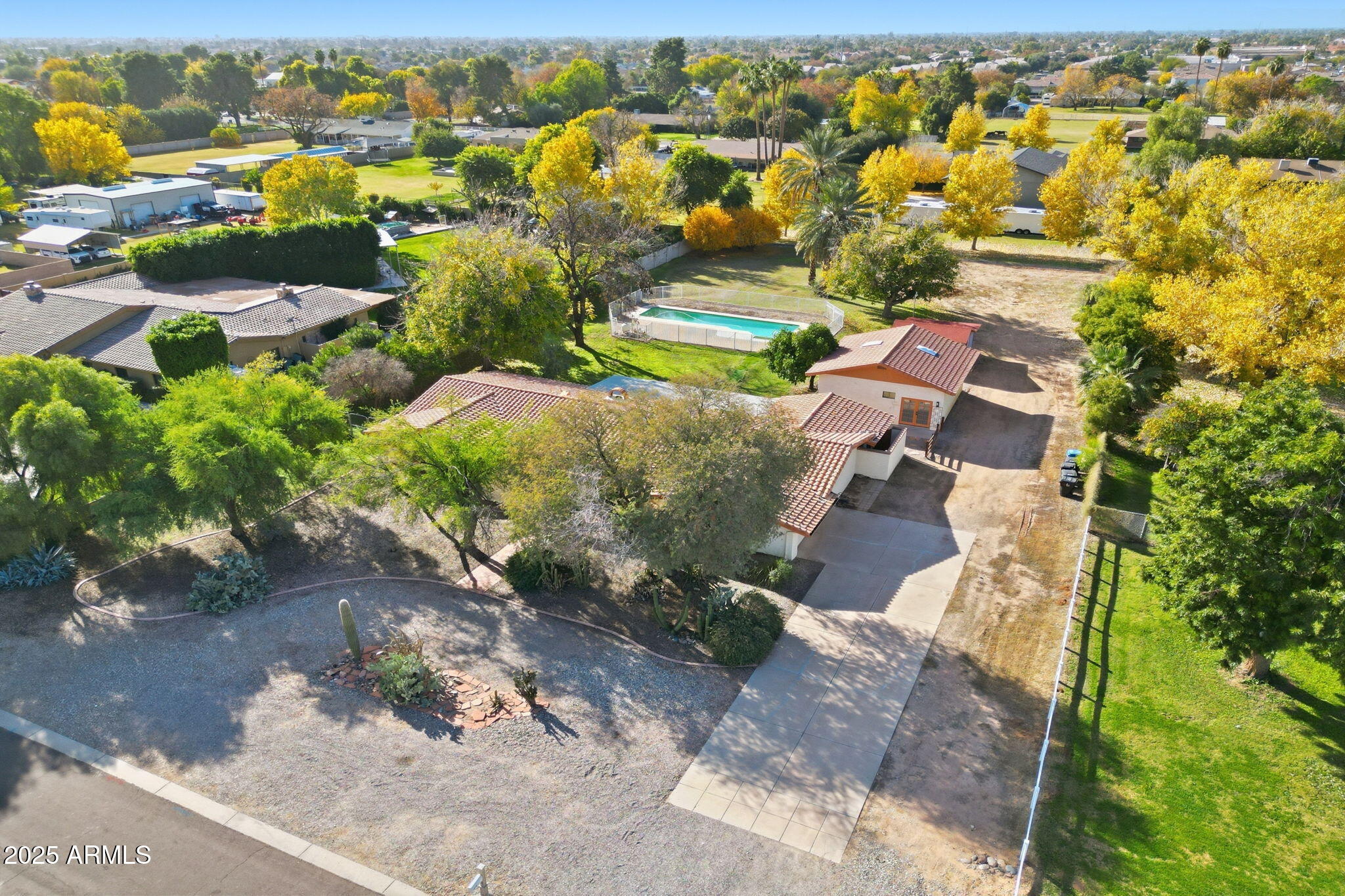 914 South 132nd Street Gilbert, AZ 85233 - Photo 7 of 55 an aerial view of residential houses with outdoor space