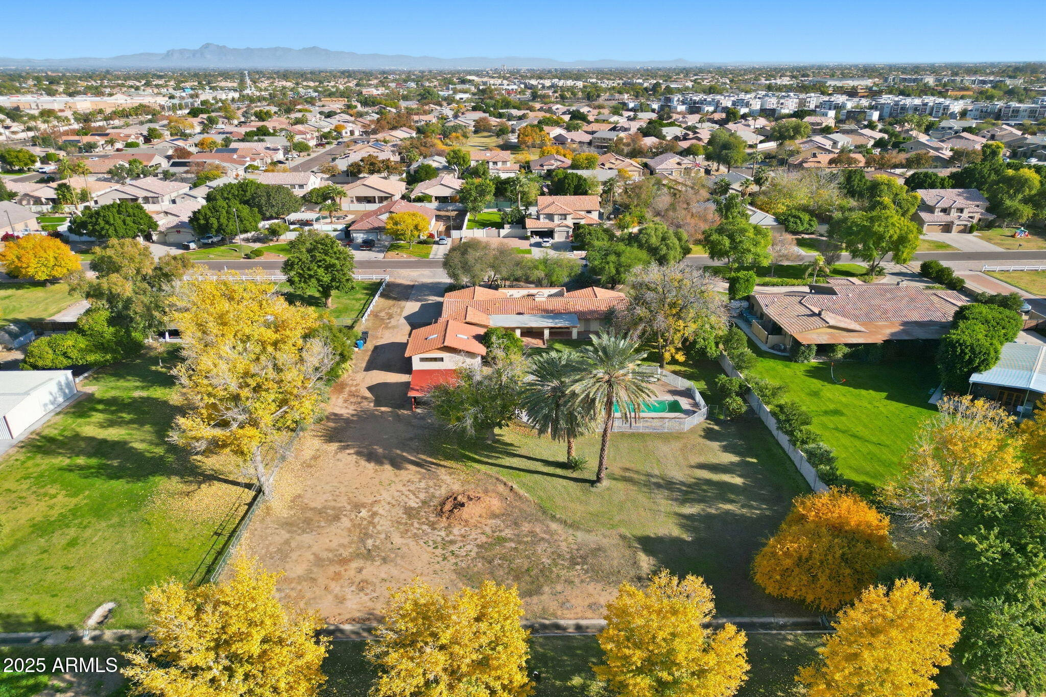 914 South 132nd Street Gilbert, AZ 85233 - Photo 9 of 55 an aerial view of residential houses with outdoor space