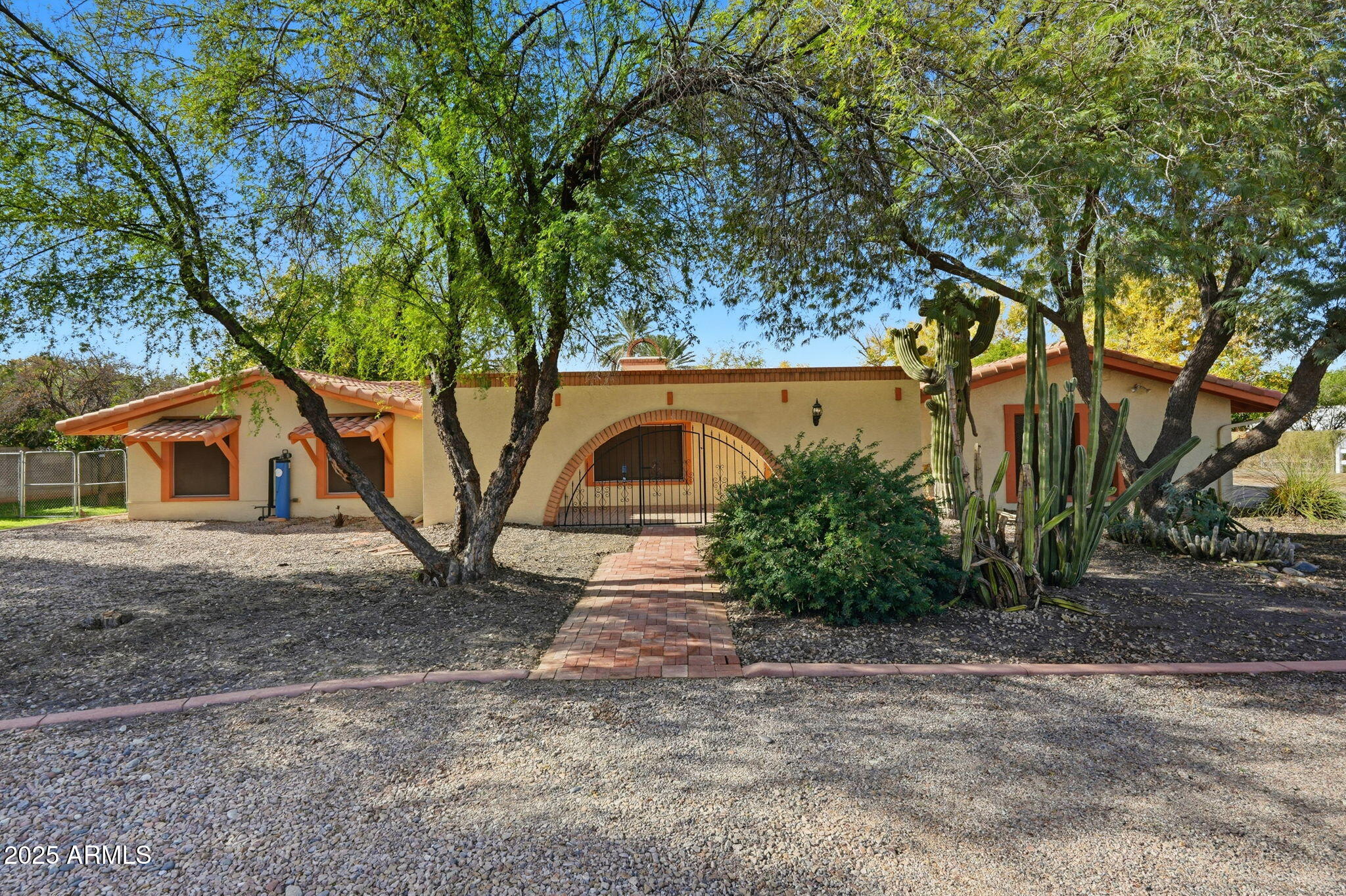 914 South 132nd Street Gilbert, AZ 85233 - Photo 10 of 55 a view of a house with a yard