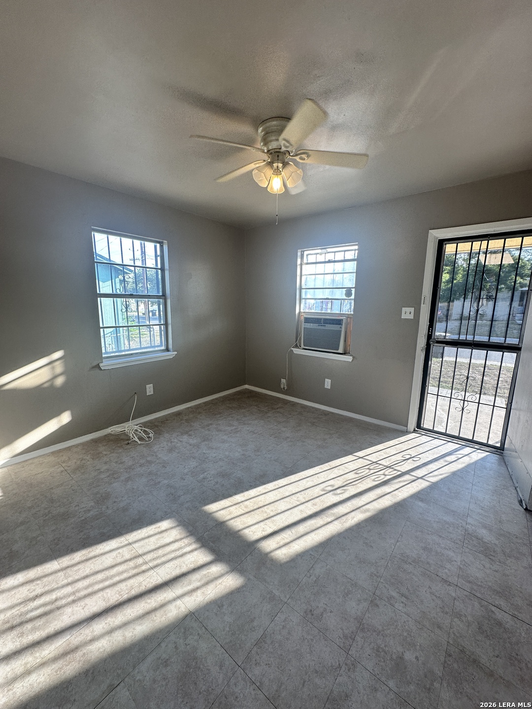 515 Clark Avenue San Antonio, TX 78210 - Photo 4 of 11 a bedroom with a bed and window