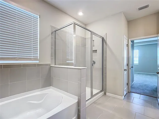 an empty room with closet area