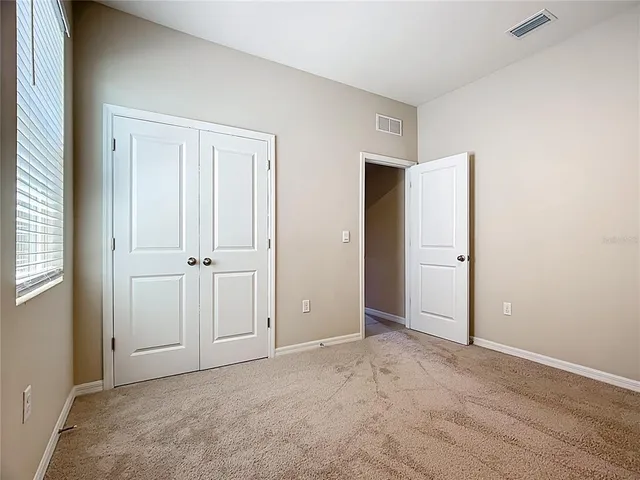 an empty room with an entryway