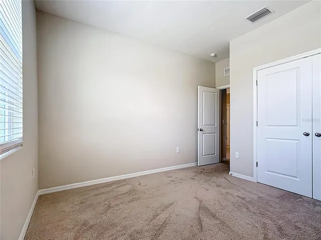 a view of a field with a big yard