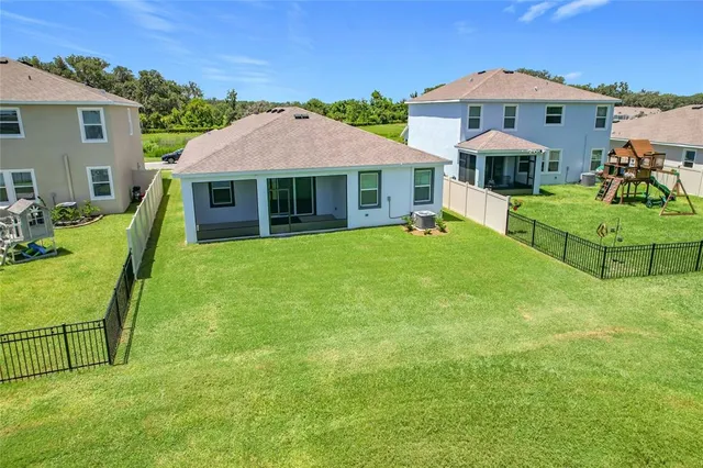 a view of a street with a building in the background