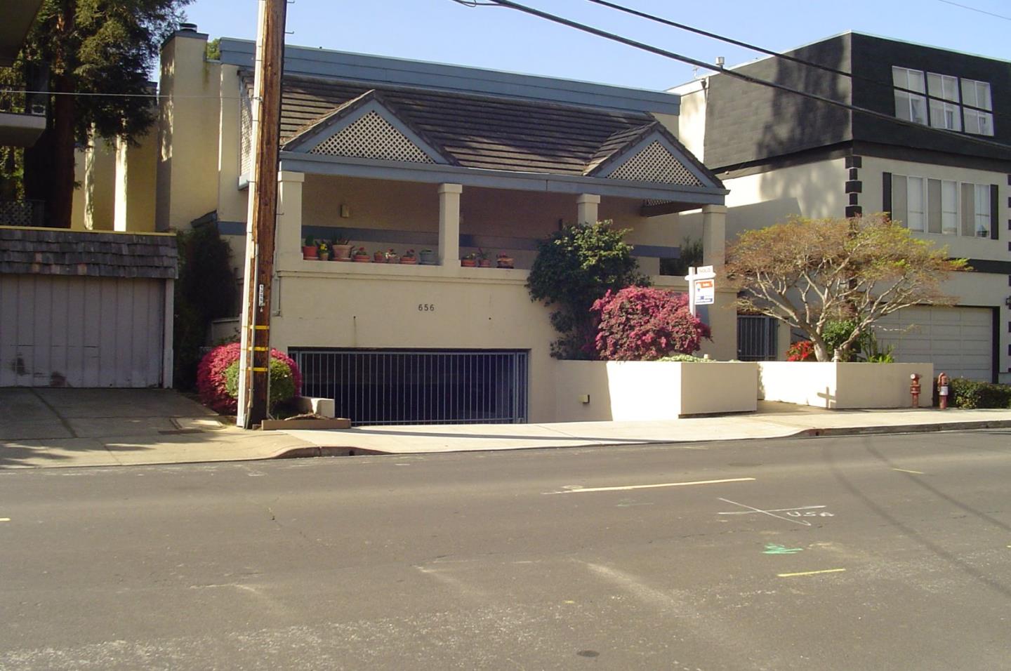 656 Cedar Street, Unit 3 San Carlos, CA 94070 - Photo 1 of 2 a front view of a house with a road