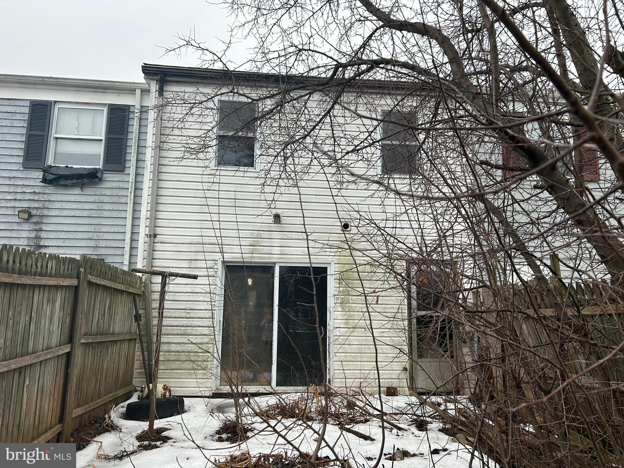 411 Clover Court Taneytown, MD 21787 - Photo 13 of 17 a brick house with tree in front of it