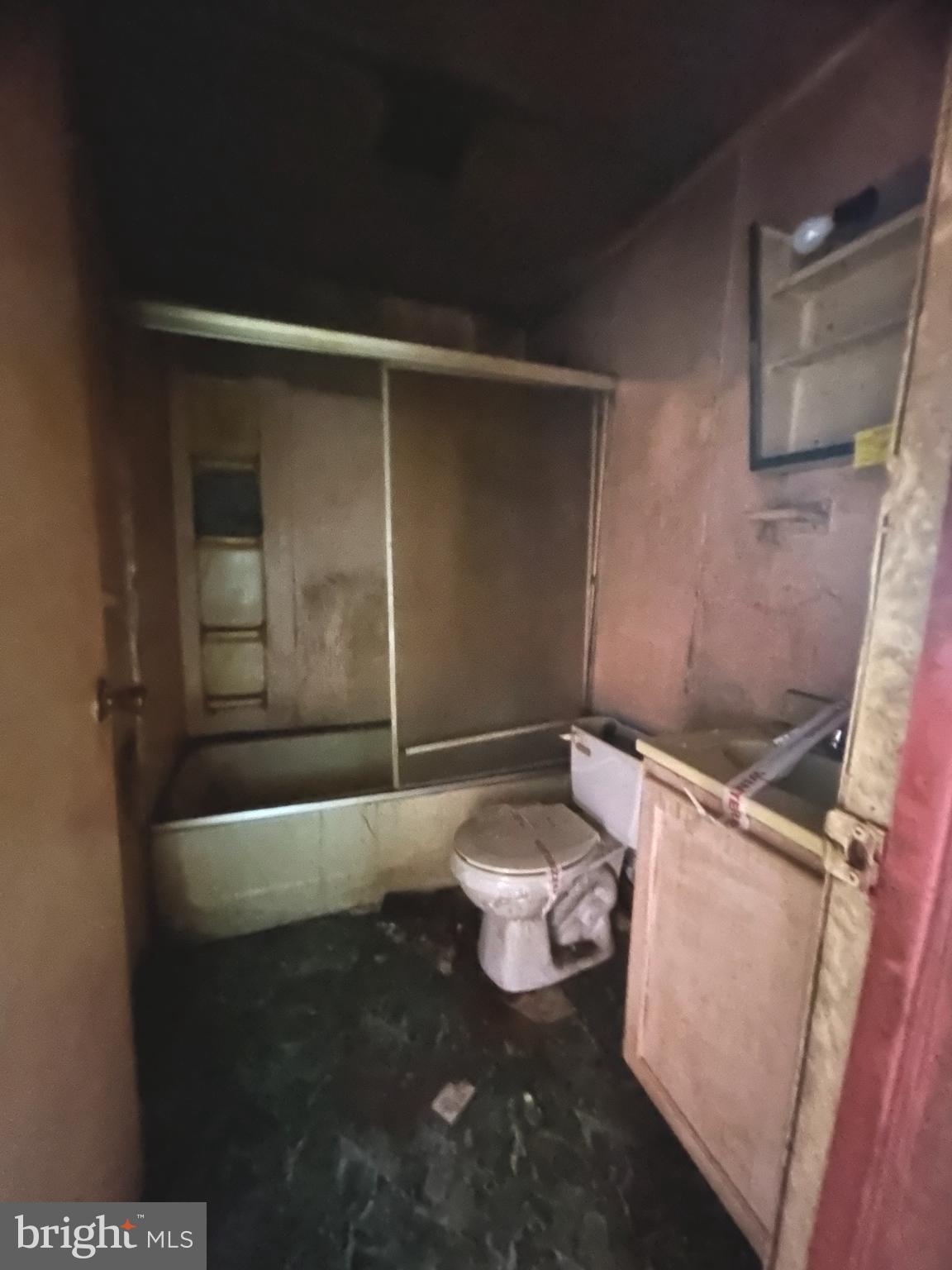 411 Clover Court Taneytown, MD 21787 - Photo 9 of 17 a bathroom with a sink and a mirror