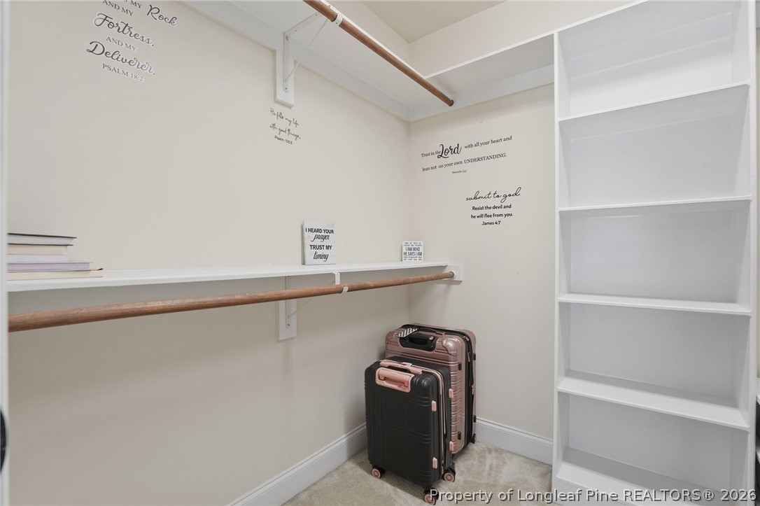 886 Micahs Way North Spring Lake, NC 28390 - Photo 25 of 50 a view of storage and utility room with racks on the wall