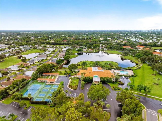 a view of a golf course with a lake