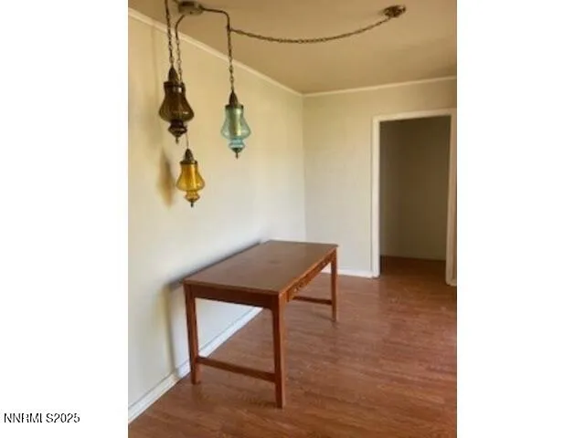 a view of a room with a table and chair