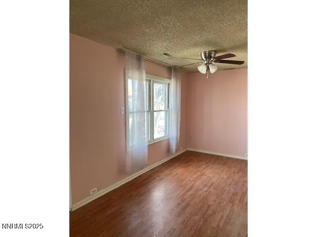 a view of a livingroom with a hard wood floor