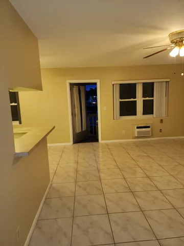 a view of empty room with windows