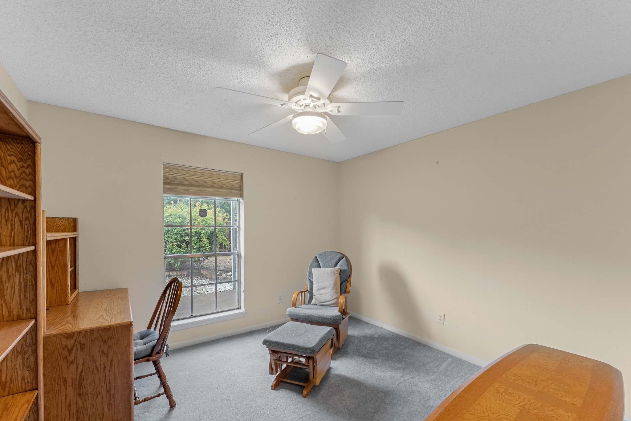 7315 Pine Street Manvel, TX 77578 - Photo 23 of 50 a workspace with furniture and a window