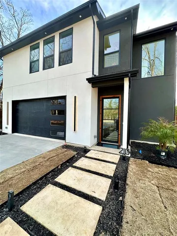 a front view of a house with yard