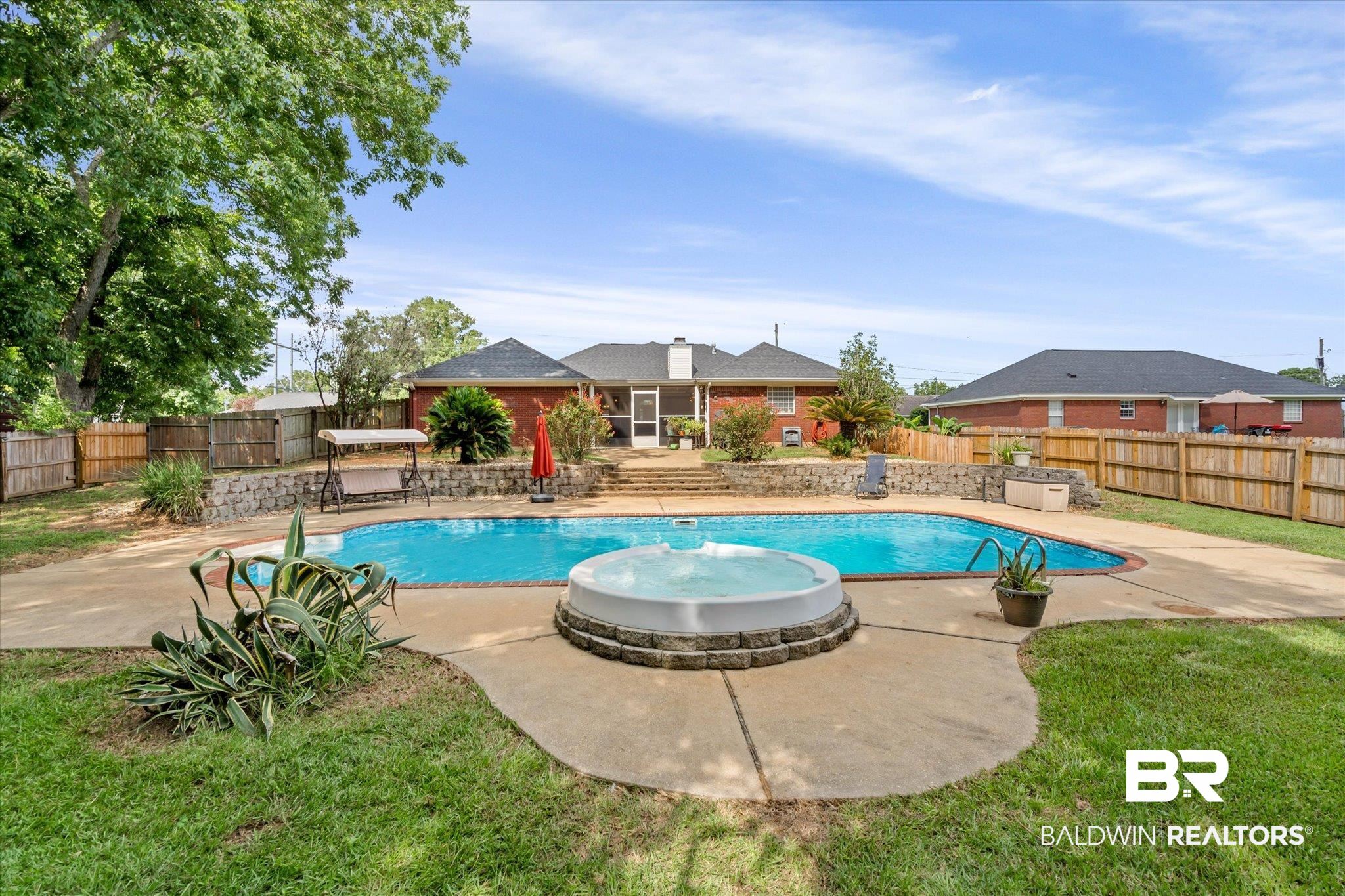2320 Sequoya Trail Mobile, AL 36695 - Photo 18 of 20 View of pool with a lawn and a patio area