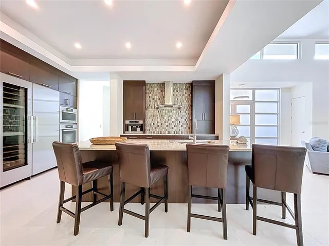 a bathroom with a sink and a large window