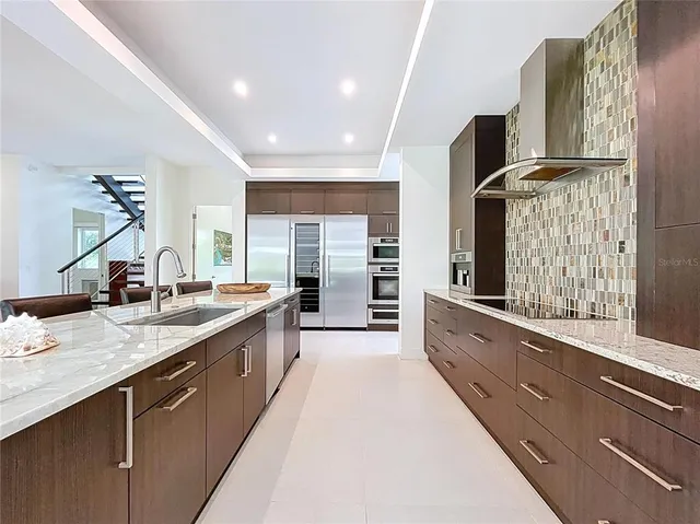 a spacious bathroom with a tub and sink