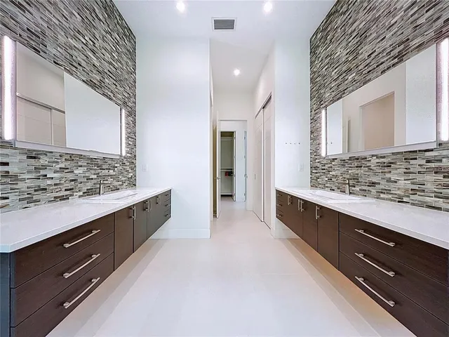 a room with gym equipment and a flat screen tv