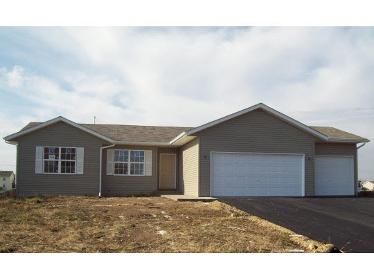 15558 Stonecrest Road South Beloit, IL 61080 - Photo 1 of 1 a house view with a backyard space