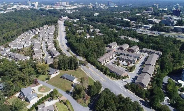 an aerial view of a city with lots of residential buildings