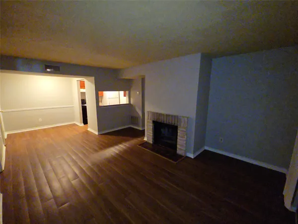 a white toilet sitting next to a bathtub