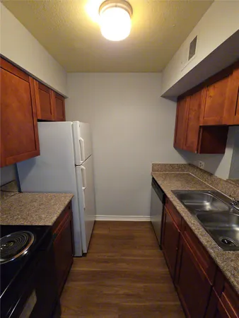 a bathroom with a toilet and a bath tub