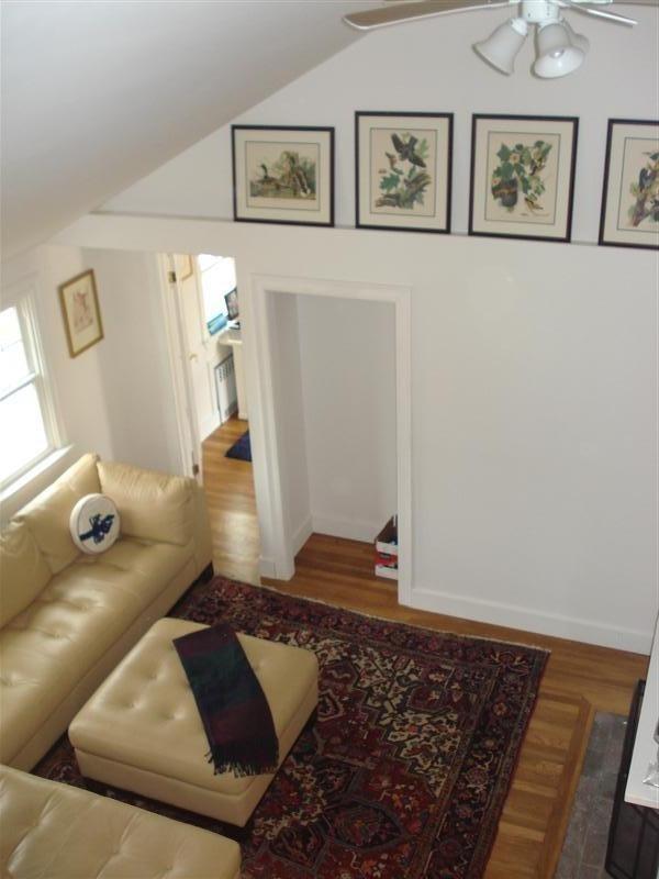 60 Elliott Road Centerville, MA 02632 - Photo 12 of 22 a living room with furniture and painting on the wall