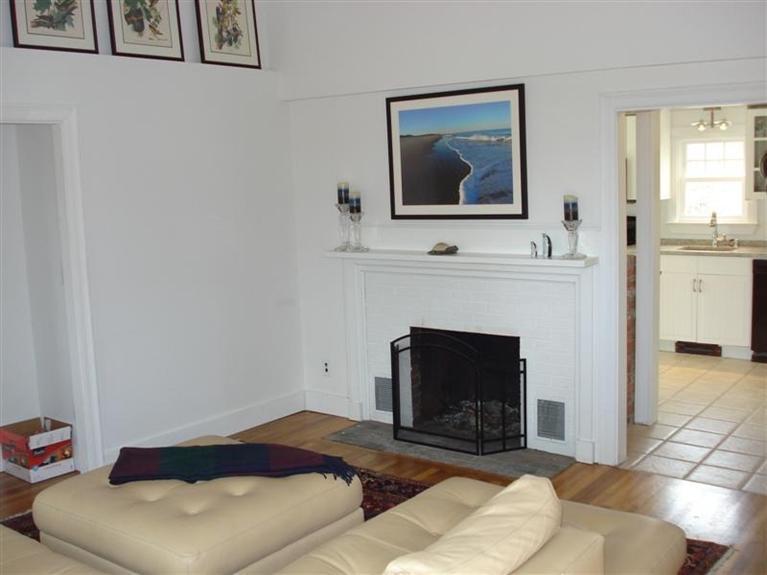 60 Elliott Road Centerville, MA 02632 - Photo 14 of 22 a living room with furniture and a fireplace