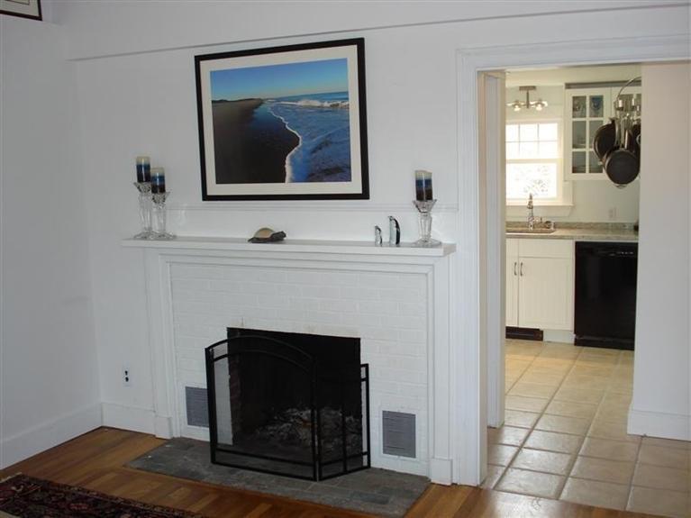 60 Elliott Road Centerville, MA 02632 - Photo 6 of 22 a hallway with fireplace