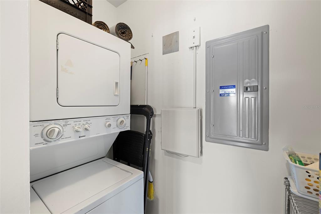 1010 Central Avenue, Unit 302 St. Petersburg, FL 33705 - Photo 13 of 50 a utility room with dryer and washer
