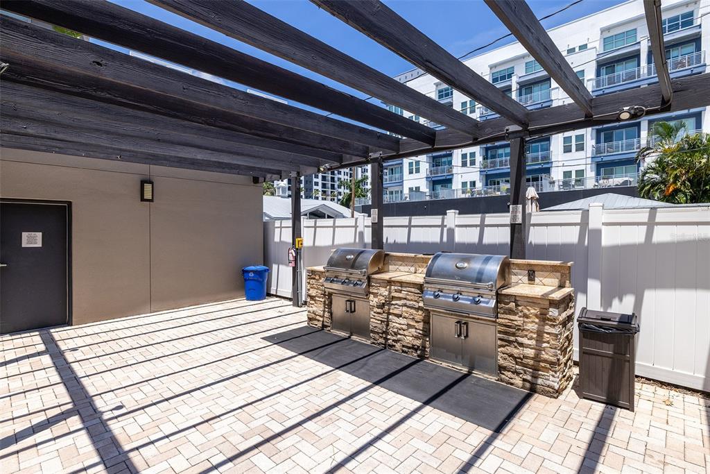 1010 Central Avenue, Unit 302 St. Petersburg, FL 33705 - Photo 36 of 50 a bedroom with furniture and a view