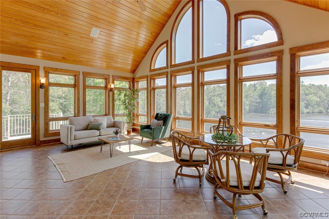 3535 Meadow Road Sandston, VA 23150 - Photo 22 of 50 a living room with furniture and floor to ceiling windows