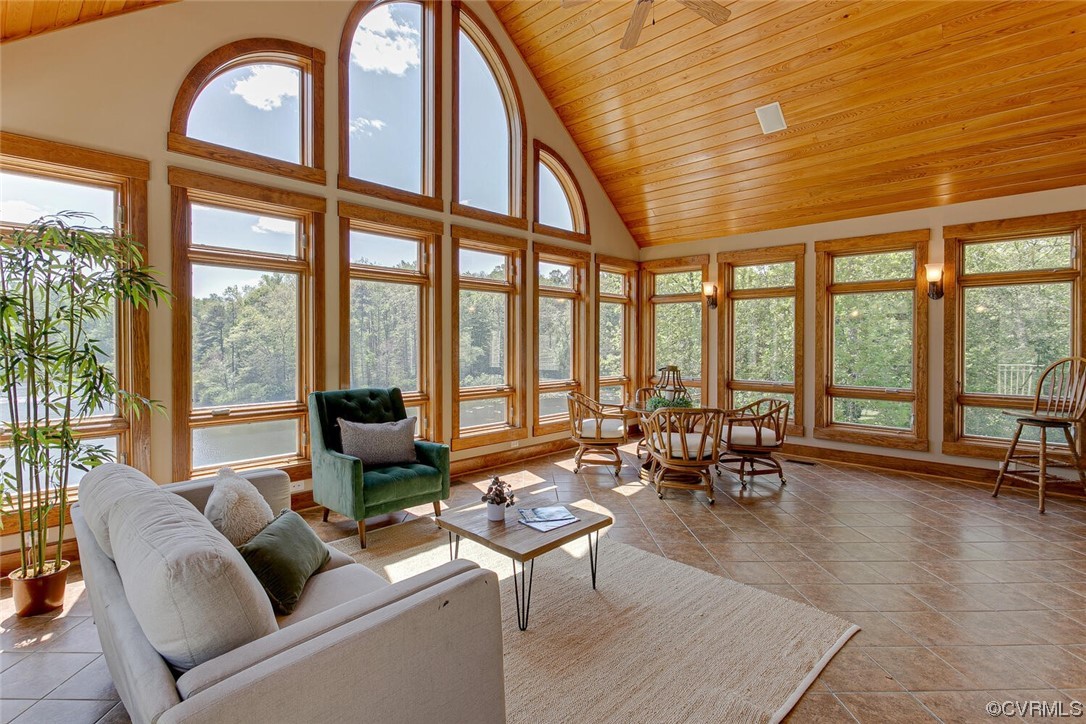 3535 Meadow Road Sandston, VA 23150 - Photo 23 of 50 a living room with furniture and floor to ceiling windows