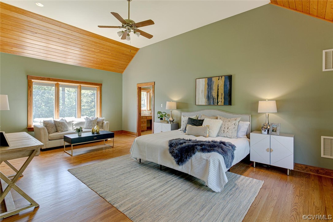 3535 Meadow Road Sandston, VA 23150 - Photo 25 of 50 a spacious bedroom with a bed couch and a window